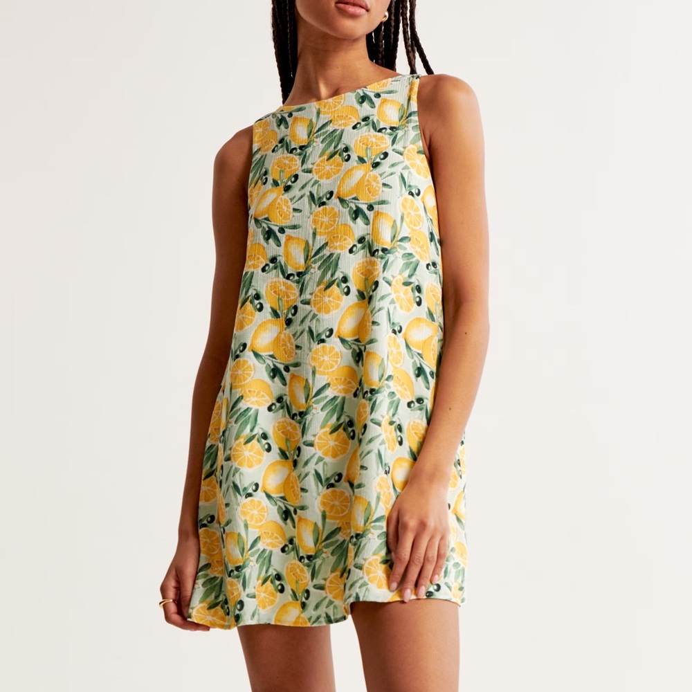 Abercrombie Women’s Lemon Print Open-Back Trapeze Mini Dress with pockets